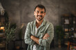 © Miljan Živković - portrait of adult man stand and smile at home