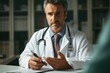 © Myimages - A professional physician in a white medical uniform talks to discuss results or symptoms and gives a recommendation to a male patient and signs a medical paper at an appointment visit in the clinic, c