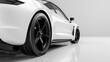 © Kanurism - Closeup of white car with black wheels for website design and development company