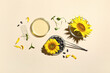 © Pixel-Shot - Laboratory glassware with sunflowers, seeds and sprouts on beige background