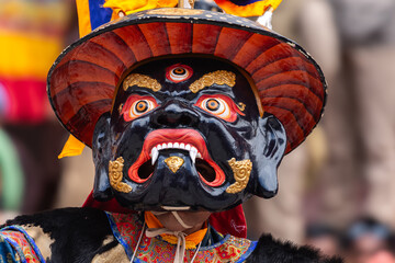 Close up of a colorful mask worn by Buddhist monks during Hemis Monastery festival at Leh, Ladakh India.