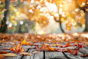 Wall Mural - wooden table with autumn leaves