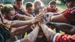 © Super - A sports team huddling together before a game, hands in the center, motivated and united