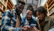 © Sheremeta - Three Young Men Looking At A Smartphone In A Library