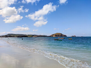 Tanjung Aan beach is a perfect place for those who want to relax, snorkel, and swim. Surrounded by hills and palm trees, this is one of the best beaches on Lombok island.