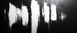 © Lucky Ai - White brush strokes overlaying black wall for textured abstract background