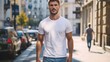 © Kenny - Handsome Man in White T-Shirt Walking on City Street on a Sunny Day