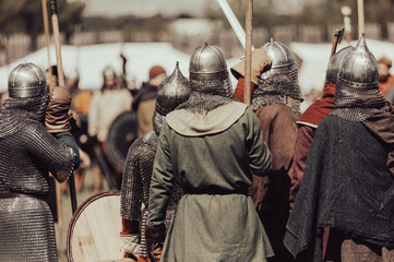 Canvas Print - Knights in armor with weapons at war