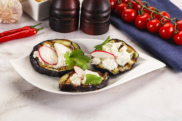 Grilled eggplant with cheese and radish