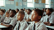 © VK Studio - A classroom full of attentive students in uniforms, with bright light streaming in, highlighting the atmosphere of education and eagerness for learning.
