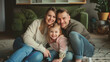 © VK Studio - A joyful family of three, parents and young daughter, sitting on a living room floor, smiling brightly and enjoying their time together.