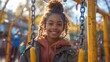 © Vilaysack - Joyful young girl with curly hair smiling and enjoying her day at a colorful playground in bright sunshine.