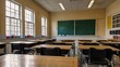 © Robiul - a empty student desk arrangement in a classroom with a blurry background