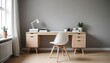 © LetsRock - Interior design of modern scandinavian home office with a wooden drawer writing desk and a white chair against a grey wall