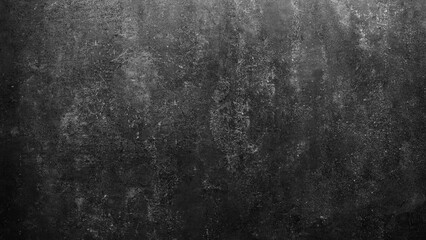 Aufkleber - A black and white photo of a wall with a rough texture. The wall appears to be made of concrete and has a lot of cracks and holes. The photo has a moody and somewhat ominous feel to it