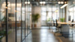 © Lull - Blurred modern office design with glass partitions. Abstract view of a contemporary office interior with glass partitions, creating a bright and airy atmosphere.