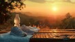© gita - A pair of running shoes, a water bottle, and a towel sit on a wooden surface against a backdrop of a vibrant sunset.