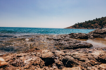 Wall Mural - A blue transparent sea in the mountains