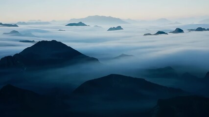 Sticker - High above the silhouettes of mountains can be seen amidst the sea of dark clouds.