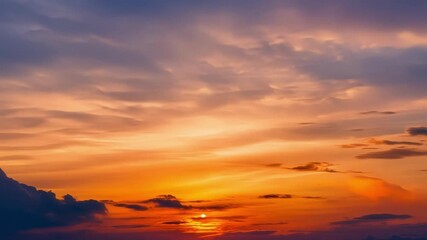 Poster - As the sun dips below the horizon the fading light delicately outlines each cloud with a touch of warmth.