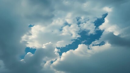 Wall Mural - The camera zooms in on a of clouds revealing intricate patterns and shapes as if they were a living organism.