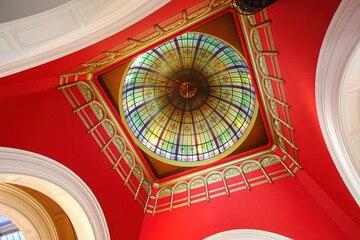 Stained glass dome in the Queen Victoria Building, a 19th century Romanesque Revival style shopping mall located in downtown Sydney, New South Wales, Australia