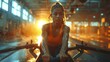 © Atmospheric stock - Woman Rowing in Gym with Intense Sunlight 1
