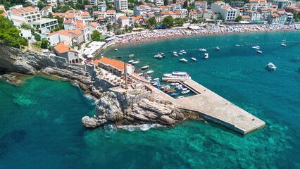 Wall Mural - Aerial view of the Kastio Castle built on a peninsula in Petrovac na Moru, a resort town located on the coast of the Adriatic Sea in Montenegro