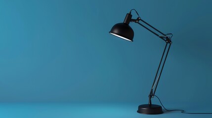 Poster - A black desk lamp on a blue background.