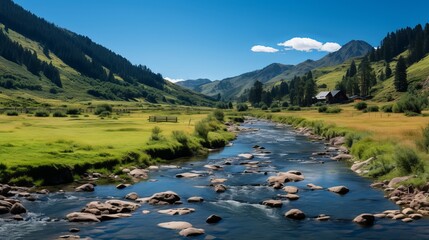 Wall Mural - Tranquil rural landscape with houses by a flowing river under a bright blue sky.