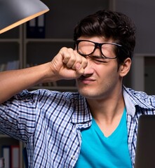 Sticker - Student preparing for exams late night at home