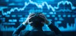 © DJSPIDA FOTO - A businessman looking at declining financial charts with a worried expression, depicting the collapse of economic circulation