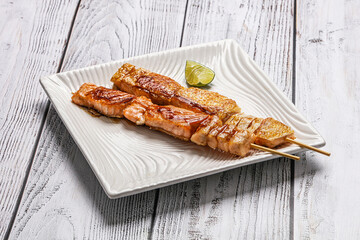 Wall Mural - Grilled salmon skewer with sauce