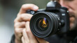 © forenna - Young Man with Digital Camera, Taking a Picture - Professional Photographer at Work, Equipment in Hand, Journalism or Hobbyist Photography Photo