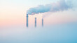 © forenna - Industrial landscape with tall smokestacks emitting thick smoke, enveloped in heavy fog. This image highlights the severe impact of industrial pollution on the environment, emphasi