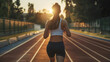© Stefan - Rearview of female athletic runner, racing athlete, racer or jogger running outside on track, sport girl training on sports court, preparing for competition, exercising speed sprint woman doing cardio