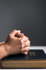 Poster - Woman raises her hand in prayer, with deep faith in God, worshiping Jesus Christ in a moment of holy peace and devotion. woman, hand, pray, faith, religion, jesus christ, christian, god, holy.