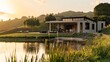 © Sirichat. Camphol - Photograph of a modern farmhouse with large windows and a flat roof, located in New Zealand on a lake surrounded by lush green hills. The image is split into several shots taken from different angles.