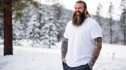 A cheerful model showcases a stylish white t-shirt in a snowy landscape