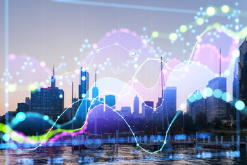 Wall Mural - Cityscape with financial graphs and data analytics concept.