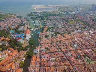 Aerial drone view of big and dense Malacca City with Malacca River at Melaka, Malaysia.