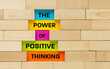 © Rochu_2008 - Positive thinking symbol. conceptual words, Power of positive thinking slogan written on beautiful colorful background between wall. Motivational message of positive thinking. Copy space.