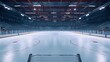 © Gia - An empty ice hockey rink with lights on, surrounded by stadium seating and a central scoreboard, ready for a game or practice session to commence shortly.