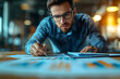 © Gonzalo - Business Professional Analyzing Growth Data on Graphs and Charts for Improvement