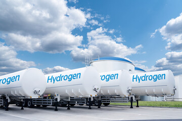 Wall Mural - Hydrogen tank trailers stand in a row. Clean fuel concept