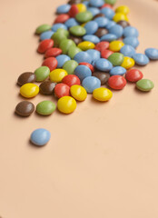 colorful candy on white background.Small candies in colored chocolate glaze. High quality photo