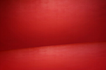 The floor and walls of the room are red as the background.