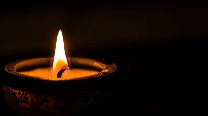 Wall Mural - Single Candle Flame in Darkness