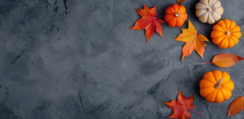 Sticker - Autumn Pumpkins and Colorful Leaves on a Dark Textured Surface