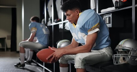 Canvas Print - Black man, football player and thinking with ball in locker room for match, game or half time. Young African or athlete getting ready or preparation in wonder for sports tournament or competition